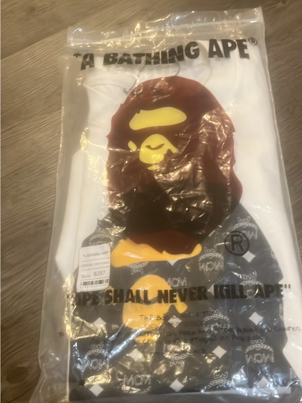 men and womans mcm bape shirt